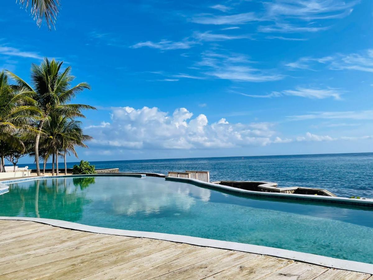 Whispering Seas Oceanfront Suite أوشو ريوس المظهر الخارجي الصورة