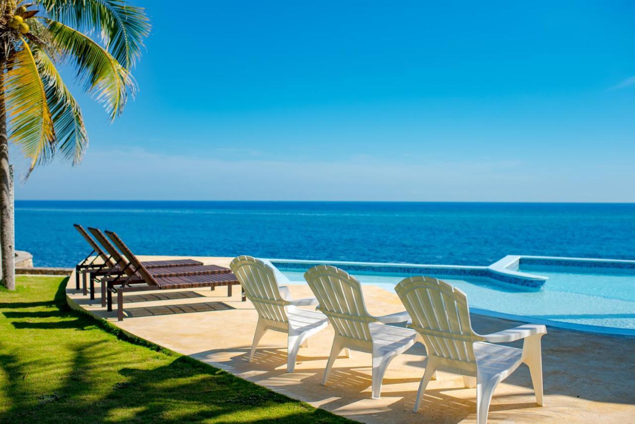 Whispering Seas Oceanfront Suite أوشو ريوس المظهر الخارجي الصورة